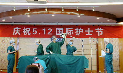 感恩三十载 扬帆再启航——记我院2015年国际护士节庆祝大会 感恩三十载 扬帆再启航——记我院2015年国际护士节庆祝大会